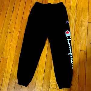 Boys black champion sweatpants size youth medium.